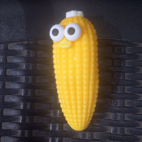סקווישי תירס קראנצ'י עם פרצוף - squishy Crunchy corn with a face