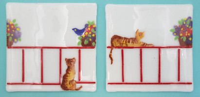 חתולים מצוירים על אריח זכוכית