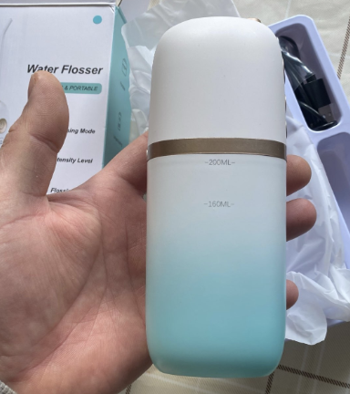 חוות דעת - סילון מים דטלי נייד Water Flosser