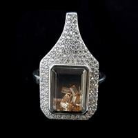 טבעת כסף משובצת אבני זרקון לבנות וזרקונים בצבע שמפנייה RG2450 | תכשיטי כסף 925