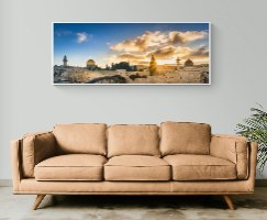 תמונת קנבס של הכותל המערבי ושקיעה תלויה על קיר בסלון