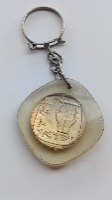 מחזיק מפתחות של מטבע 25 אגורות תשכ"ו, ישראל.