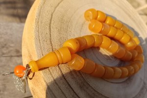 מסבחת בקליט אספנות עתיקה (עין החתול/חלמון) – עם מטבע עותומני וחמסה