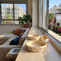 קרמיקה פיסולית בשילוב חוטי רקמה
