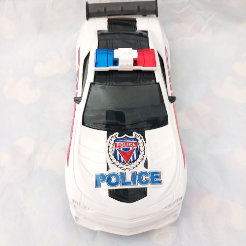 מכונית משטרה צבע לבן אורות וצלילים גודל 23 ס''מ