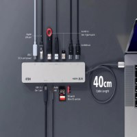 תחנת עגינה Aten UH3240 – אפורה מציגה חיבורים כולל 4K מחוברת למחשב נייד