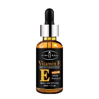 סרום להבהרת כהויות ומיצוק העור - ויטמין E
