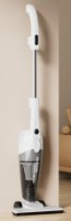 שואב אבק קומפקטי Deerma DX118C – שואב האבק הלבן והאפור עומד זקוף על רצפת עץ על רקע קיר בהיר