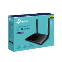 נתב Tp-Link Archer MR200 AC750 – הנתב השחור מונח על האריזה הכחולה הממותגת עם הכיתוב TP-Link