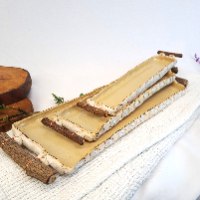 סט מגשי אדמה מוארכים בשילוב ענפי עץ גולמי וחוטי נחושת