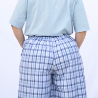 מכנסיים מדגם קרן עם משבצות בכחולים ולבן