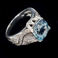 טבעת כסף משובצת טופז כחול ואבני זרקון לבנות RG2430 | תכשיטי כסף 925