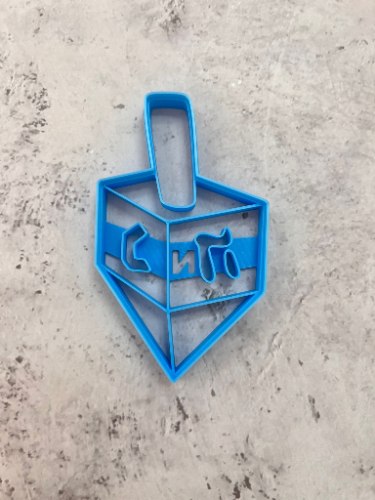 חותכן בצורת סביבון