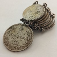 10 מטבעות רוסיים מחוברים עם לולאות. משקל כללי 22 גרם