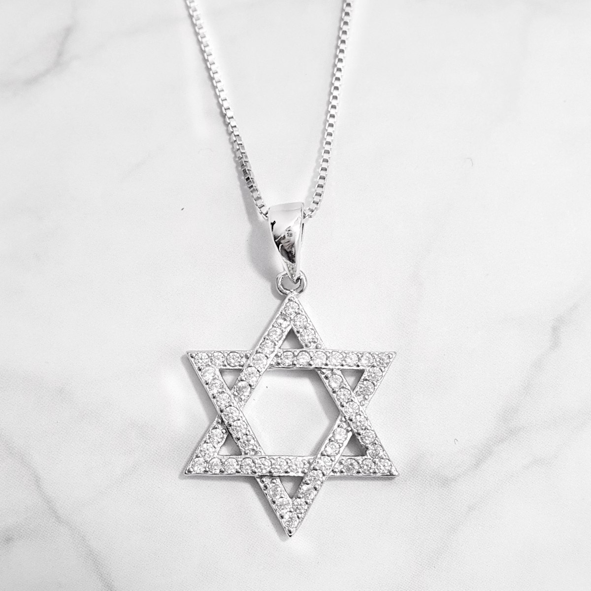 מגן דוד מכסף משובץ אבני זרקון T6444