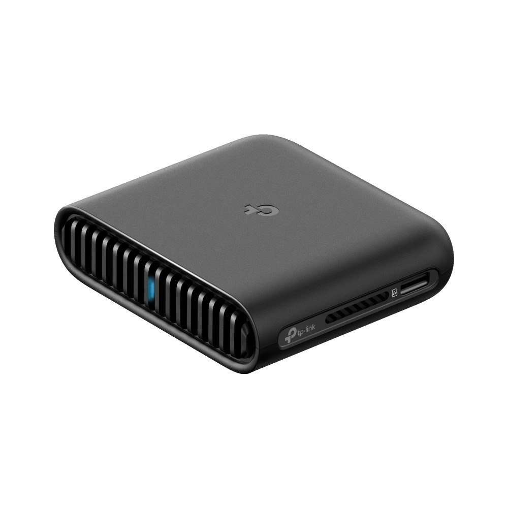 נתב אלחוטי TP-Link TL-WR3002X Wi-Fi6 – פריט בודד הנתב האפור כהה מציג סבכה קדמית ונורית כחולה דולקת