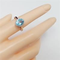 טבעת מכסף משובצת אבן טופז כחולה מרכזית וזרקונים RG1567 | תכשיטי כסף 925 | טבעות כסף