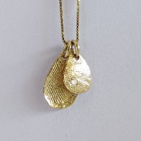 שרשרת עם זוג טביעות אצבע - עבודת יד - כסף וציפוי זהב