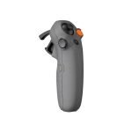 רחפן DJI Avata 2 Fly More Combo (3 Batteries) – בקר תנועה אפור בודד עם כפתור כתום מונח באלכסון על רקע לבן