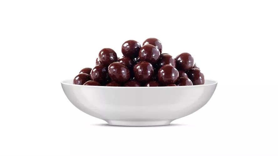 אגוז לוז בציפוי שוקולד מריר 100 גרם