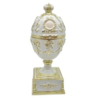 White Faberge Egg with Swan Inside