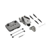 רחפן DJI Lito 1 – רחפן אפור מקופל מונח לצד שלט רחוק פרופלורים עם 8K