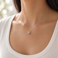 שרשרת זהב צהוב 14K עדינה עם תליון בלו טופז סקאיי אובלית בעבודת יד