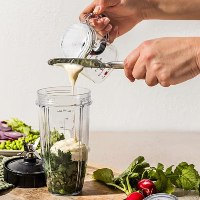 כוס מדידה מתכווננת עם מנגנון הוצאת חומר ללא שאריות - Cookra