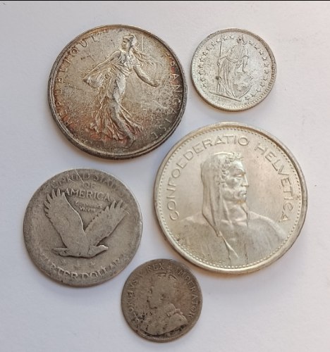5 מטבעות כסף מהעולם