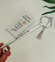פנקס אישי עם עט בצורת מפתח