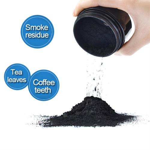 אבקת פחם טבעית להלבנת השיניים