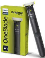 מכונת גילוח נטענת Philips One Blade QP1424 – USB מכשיר גילוח שחור עם להב צהוב מונח ליד אריזה ירוקה בהירה