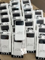 מטען נייד בכיתוב לייזר צבע לבן